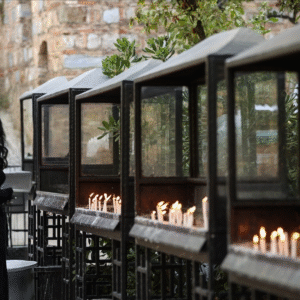 light a candle- Pilgrimage and Traditions -Lighting candles inside Virgin Mary House chapel, a tradition of prayer and hope