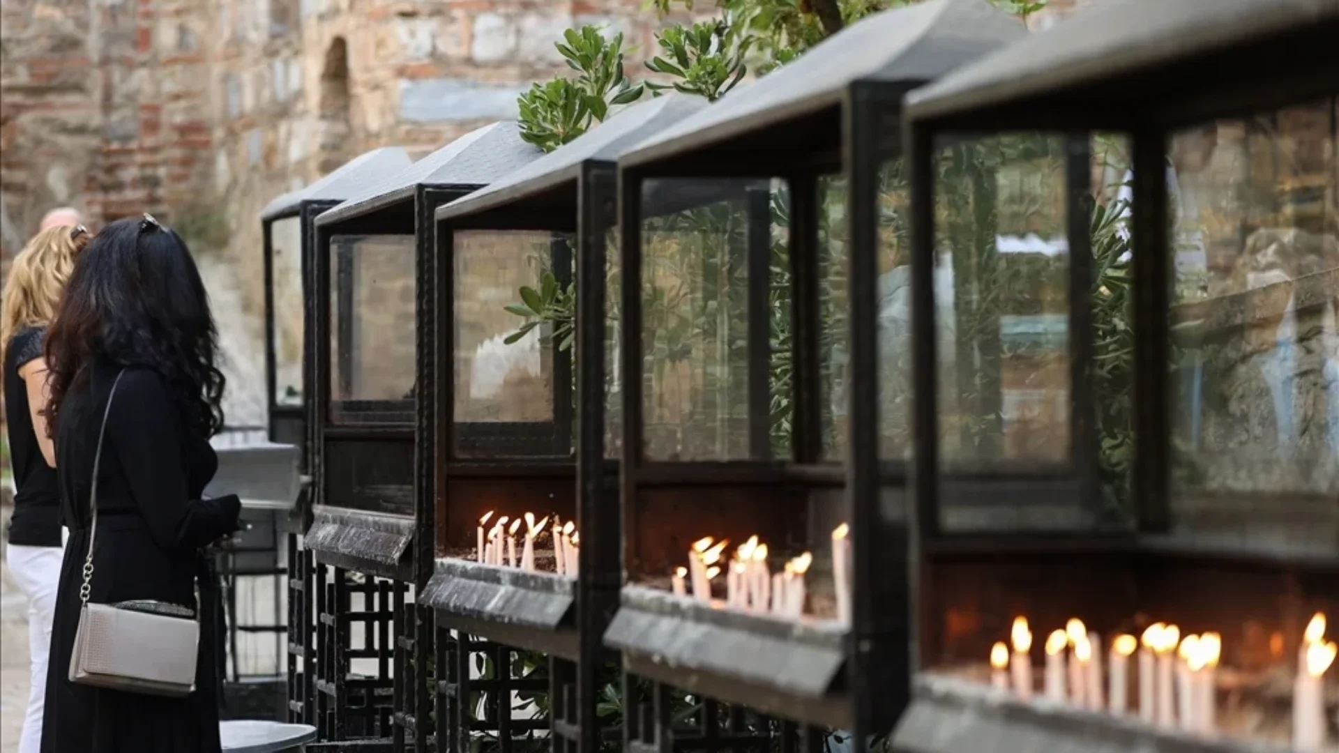 house - of - virgin - mary - candle - lighting