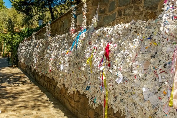 The Wishing Wall with prayer notes at the House of Virgin Mary in Ephesus
